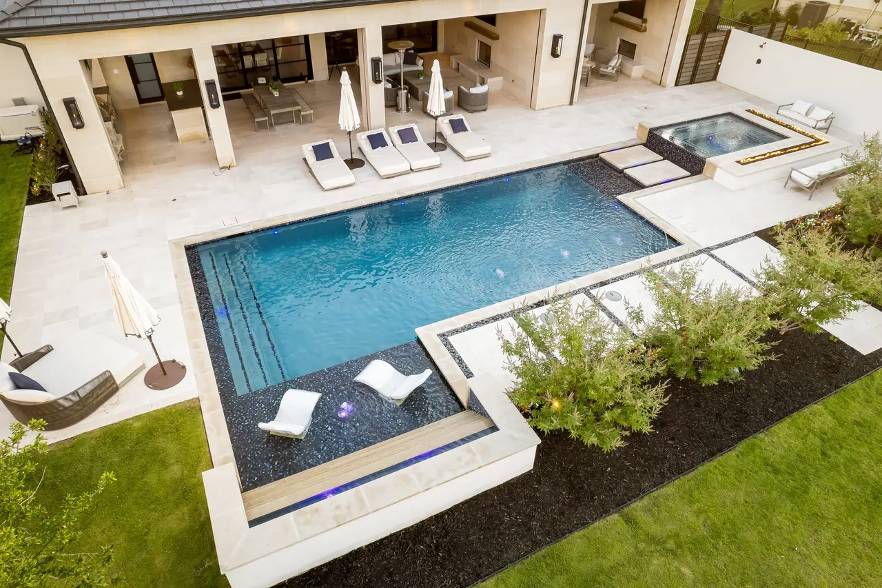 Aerial view of a completed Verde Outdoors pool and outdoor living project in Southlake, TX